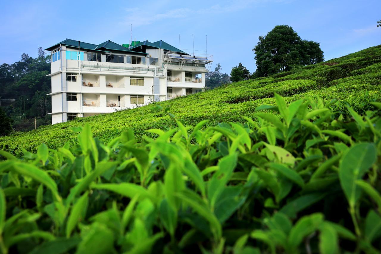 Monsoon Grande Hotel Munnar Exterior photo