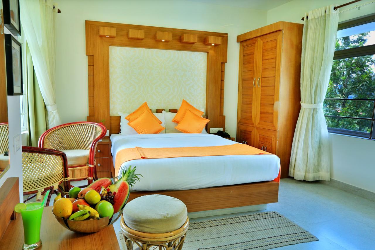 Monsoon Grande Hotel Munnar Exterior photo