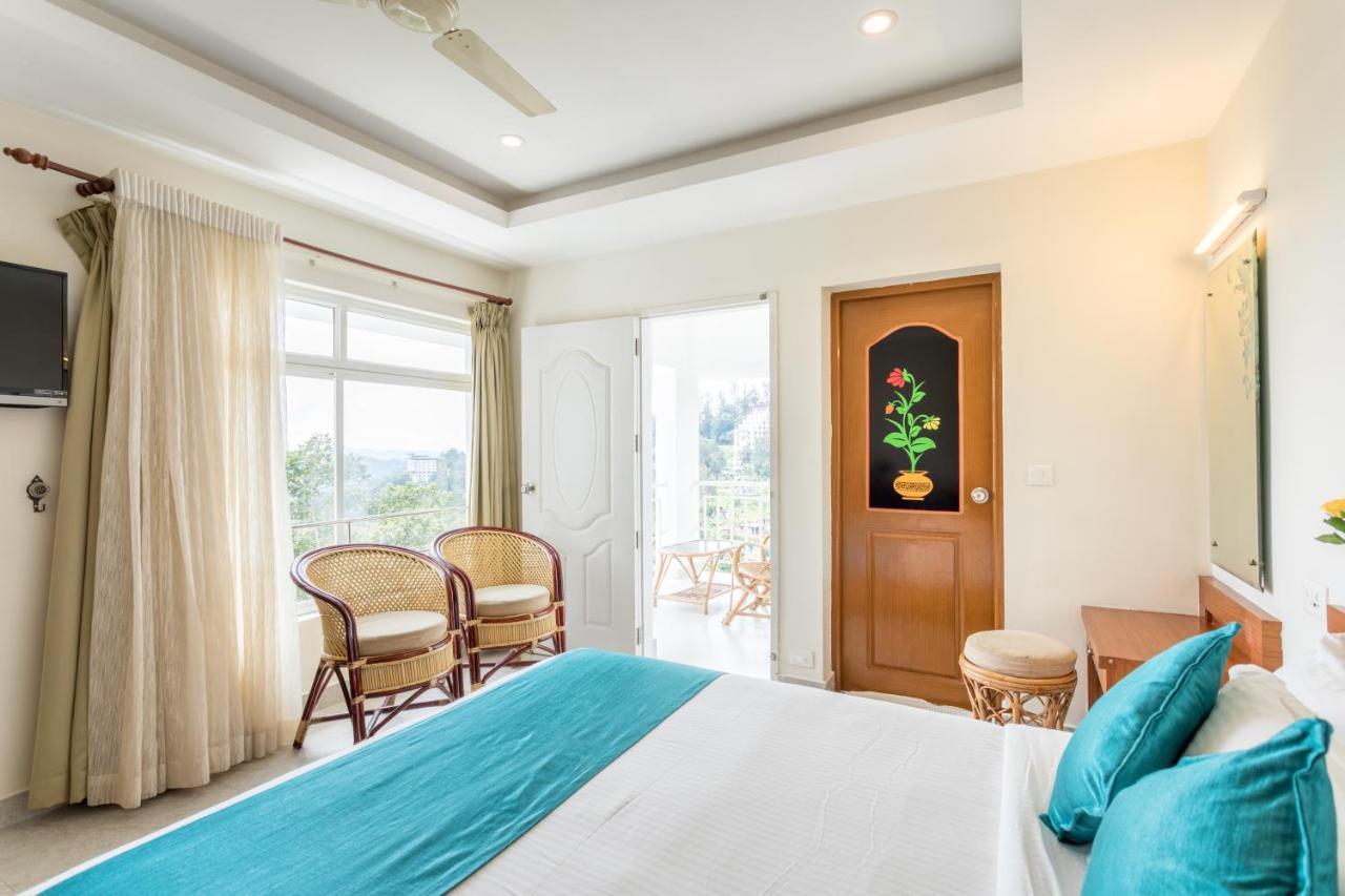 Monsoon Grande Hotel Munnar Exterior photo